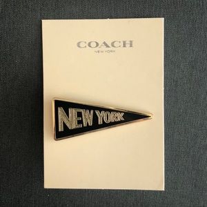 Coach NY Enamel Pennant Pin